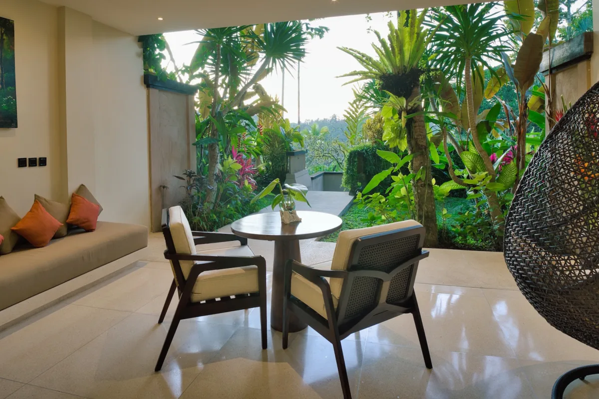 Private Garden Royal Suite living area with tropical garden views at Nandini Jungle by Hanging Gardens in Ubud, Bali