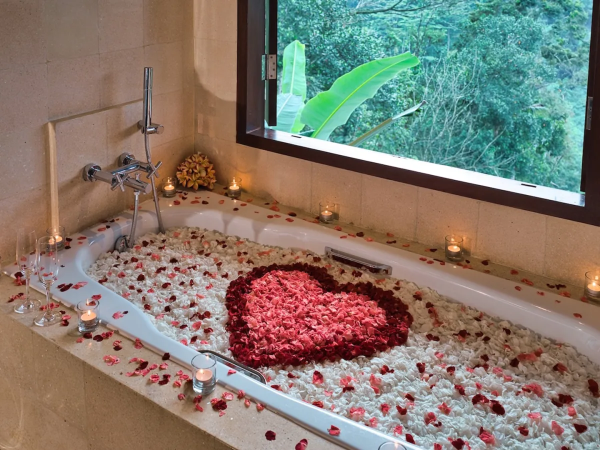 Romantic flower bath with candles inside the Panoramic Jungle View Villa in Ubud, Bali