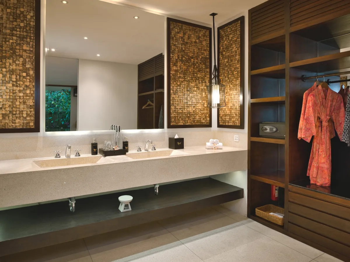 Presidential Royal Suite bathroom with double vanity, mirrors, and wooden wardrobe in Ubud, Bali
