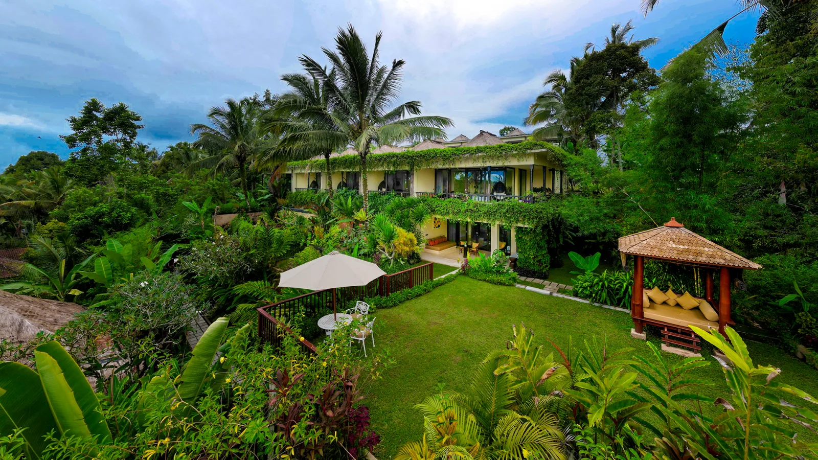 Presidential Royal Suite surrounded by lush tropical gardens at Nandini Jungle by Hanging Gardens in Ubud, Bali