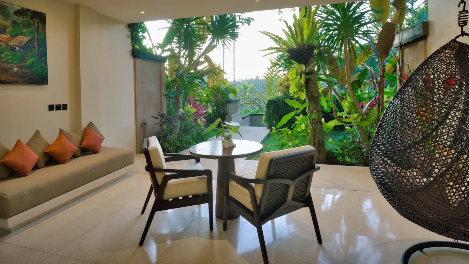 Private Garden Royal Suite living area with tropical garden views at Nandini Jungle by Hanging Gardens in Ubud, Bali