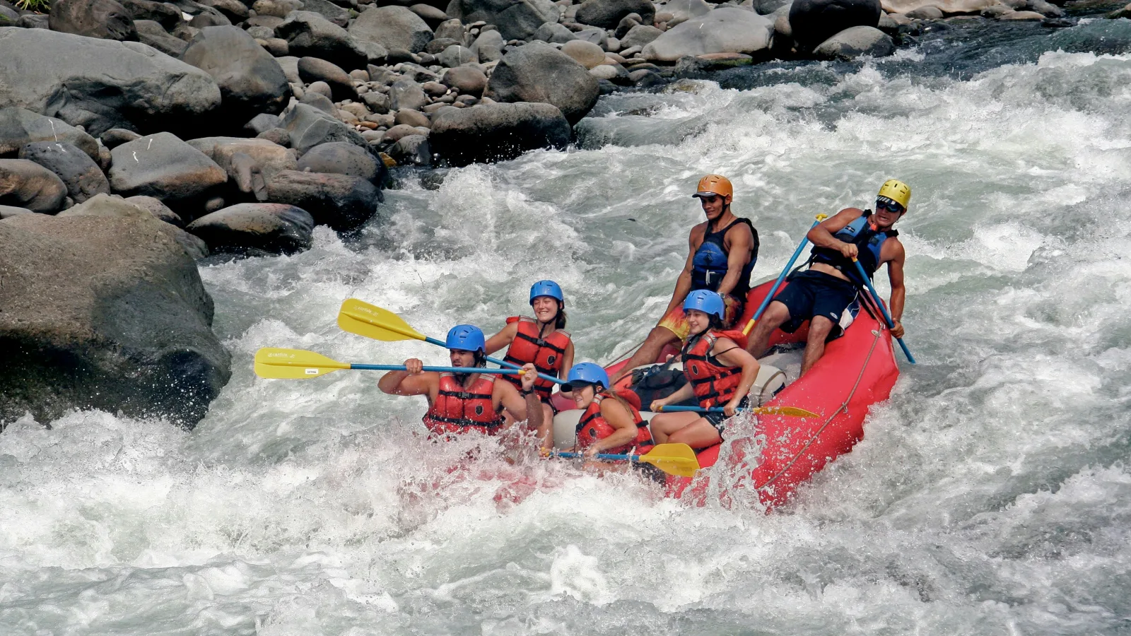 Guests enjoying a guided Ayung River rafting experience near Nandini Jungle by Hanging Gardens in Bali