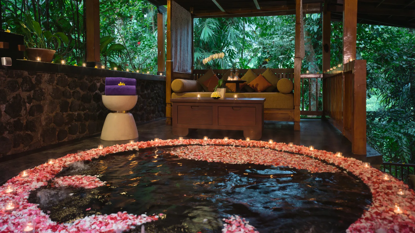 Secluded Jungle Jacuzzi surrounded by tropical greenery at Nandini Jungle by Hanging Gardens in Bali.