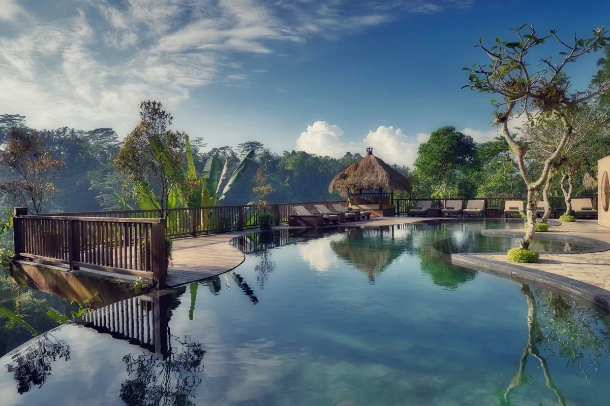 Infinity pool overlooking the tropical jungle at Nandini Jungle by Hanging Gardens in Ubud, Bali.