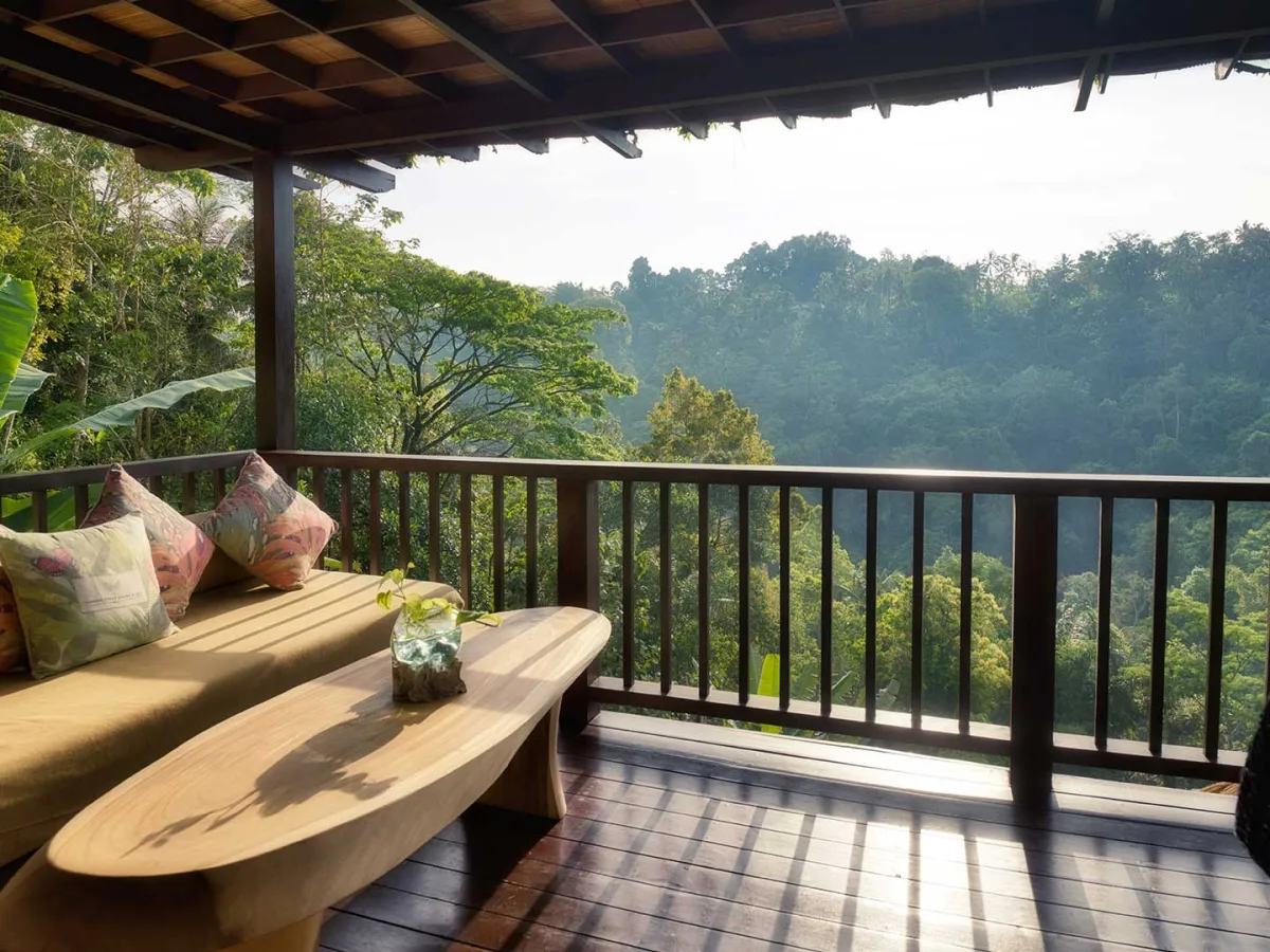 Private jungle villa terrace at Nandini Jungle by Hanging Gardens overlooking the Ubud rainforest valley